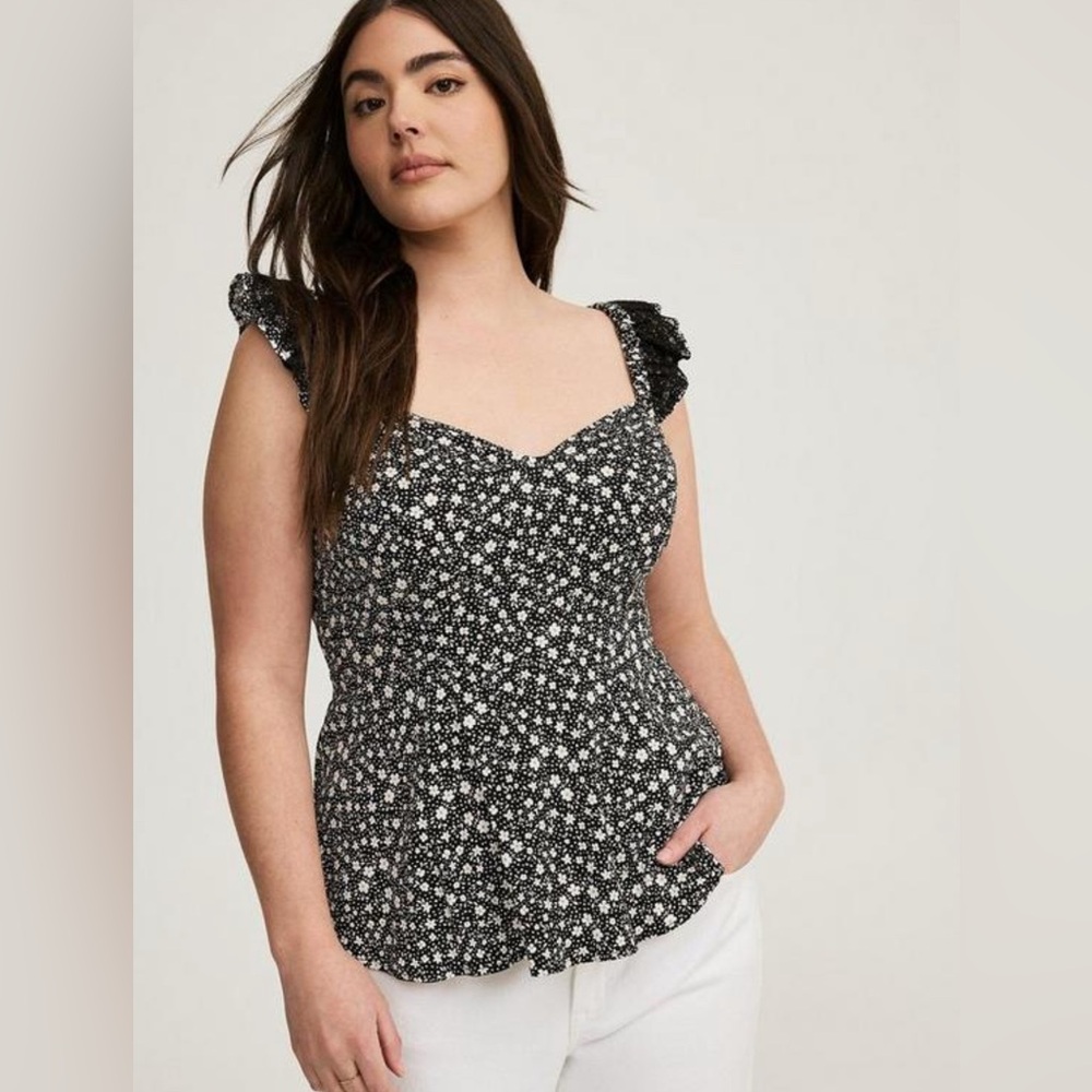 Torrid Floral Black and White Sleeveless Corset peplum blouse.
